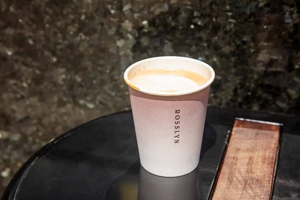 A cup of Rosslyn coffee on a table.