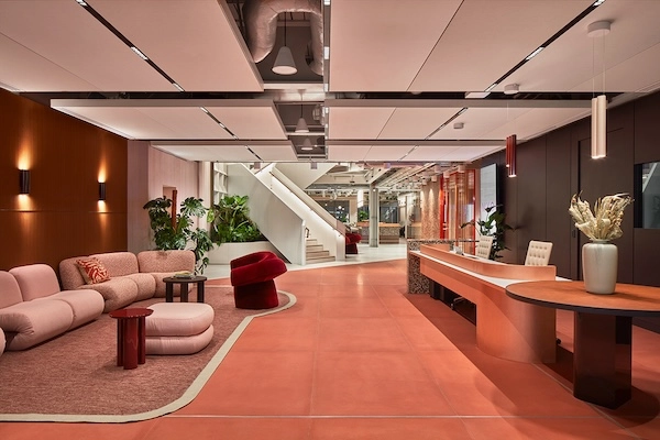 The main reception area at Myo St Pauls, complete with a seating space and hardwood floors.