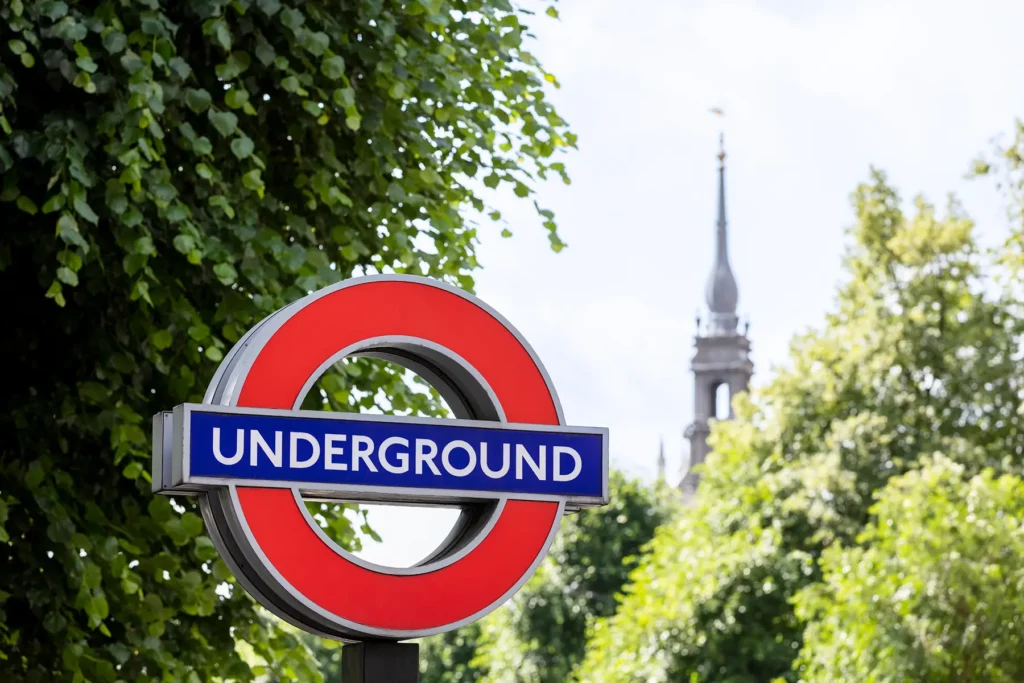St Paul's Underground station sign against some trees.