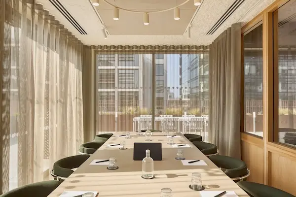 Meeting room with floor-to-ceiling windows at New Street Square.